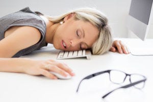 Woman is tired with sleep apnea symptoms