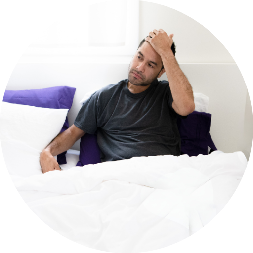 man uncomfortable and tired after waking up