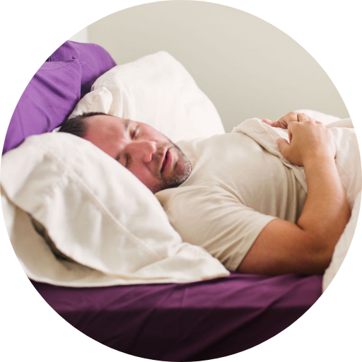 man struggling to sleep due to his untreated sleep apnea